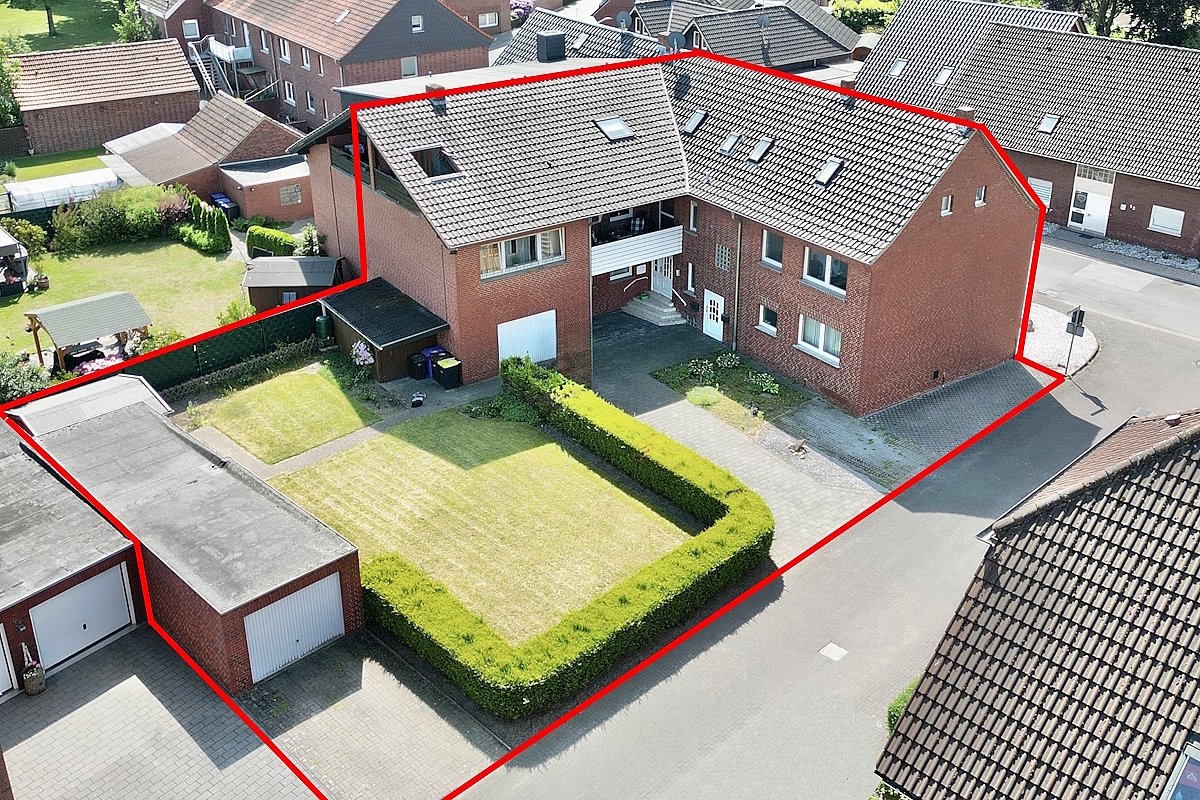 Olfen: -VERKAUFT- Gepflegtes Mehrfamilienhaus mit 2 Garagen Potenzial + Baugrundstück provisionsfrei zu verkaufen!
