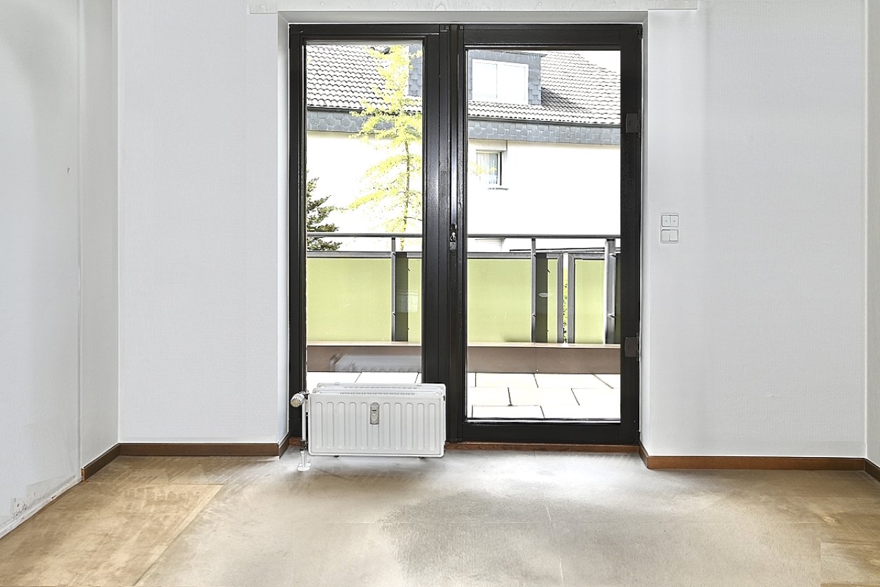 Schlafzimmer mit Balkonzugang